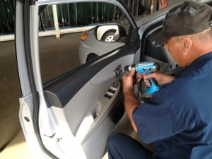 A man Repairing Power Window